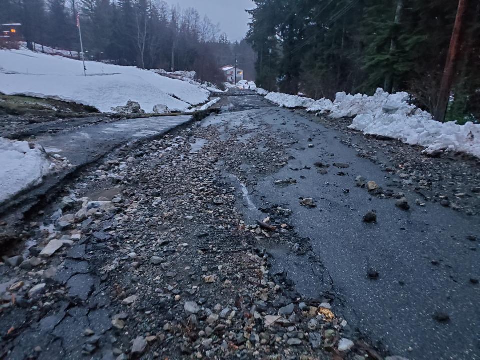 This photo provided by the Alaska Department of Transportation and Public Facilities shows damage from heavy rains and a mudslide 600 feet wide in Haines, Alaska, on Wednesday, Dec. 2, 2020. Authorities say six people are unaccounted for, and four homes were destroyed in the slide, with the search resuming Thursday morning for survivors. (Matt Boron/Alaska Department of Transportation and Public Facilities via AP)