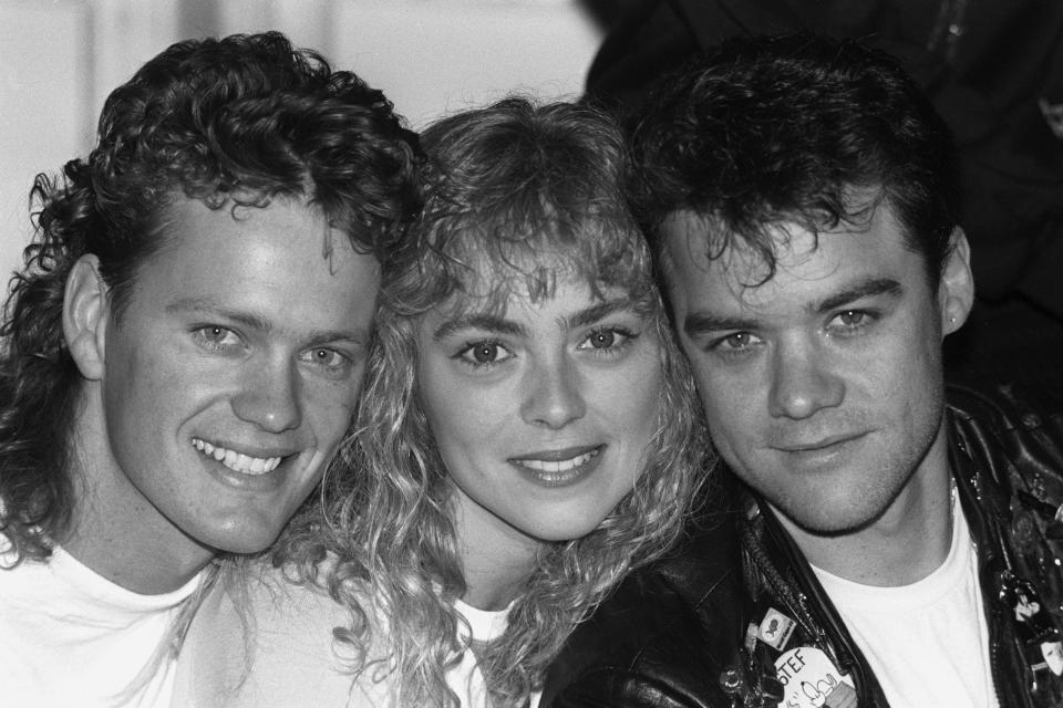 Cast members from the Australian soap opera 'Neighbours', (l-r) Craig McLachlan (Henry), Annie Jones (Jane) and Stefan Dennis (Paul), in London. They are looking forward to performing in front of royalty - alongside other residents of Ramsay Street - as the cast of 'Neighbours' are appearing at the Palladium in the Royal Variety Show.