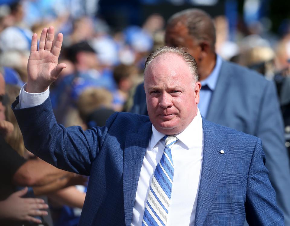 Kentucky’s Mark Stoops comes down the Catwalk Saturday afternoon as the team gets ready to play.Sept. 3, 2022