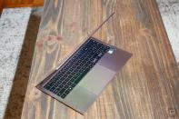 <p>Samsung Galaxy Book Pro 360 review pictures. Top view of the Book Pro 360 slightly tilted on a table.</p> 