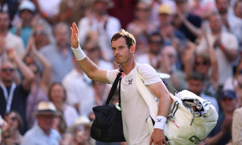 <span>Andy Murray waves to the crowd after losing to Stefanos Tsitsipas at Wimbledon 2023.</span><span>Photograph: Steven Paston/PA</span>