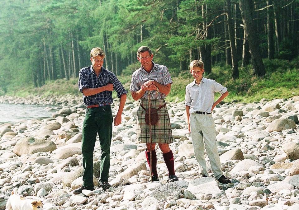 King Charles pictured with his sons Prince Harry and William