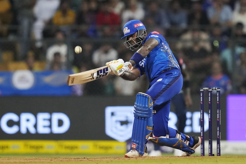 Mumbai Indians' Suryakumar Yadav plays a shot during the Indian Premier League cricket match between Mumbai Indians and Gujrat Titans in Mumbai, India, Friday, May 12, 2023. (AP Photo /Rajanish Kakade)