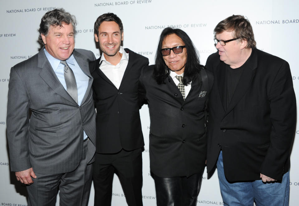 Sony Pictures Classics co-president Tom Bernard, left, director Malik Bendjelloul, musician Sixto Rodriguez and filmmaker Michael Moore, right, pose together at the National Board of Review Awards gala at Cipriani 42nd St. on Tuesday Jan. 8, 2013 in New York. (Photo by Evan Agostini/Invision/AP)
