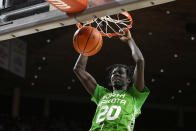 North Dakota forward B.J. Omot dunks the ball during the second half of an NCAA college basketball game against Iowa State, Wednesday, Nov. 30, 2022, in Ames, Iowa. Iowa State won 63-44. (AP Photo/Charlie Neibergall)