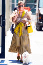 <p>Olivia Palermo rocks a boho maxi dress while walking her dog, Mr. Butler, in N.Y.C. on Monday. </p>