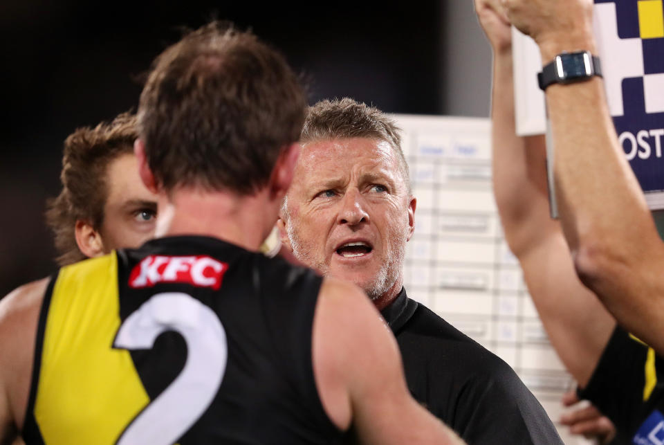 Damien Hardwick speaks to his team.