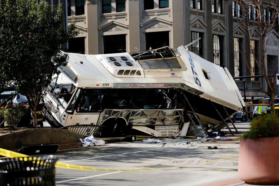 One of the two buses involved in an accident is seen in Newark