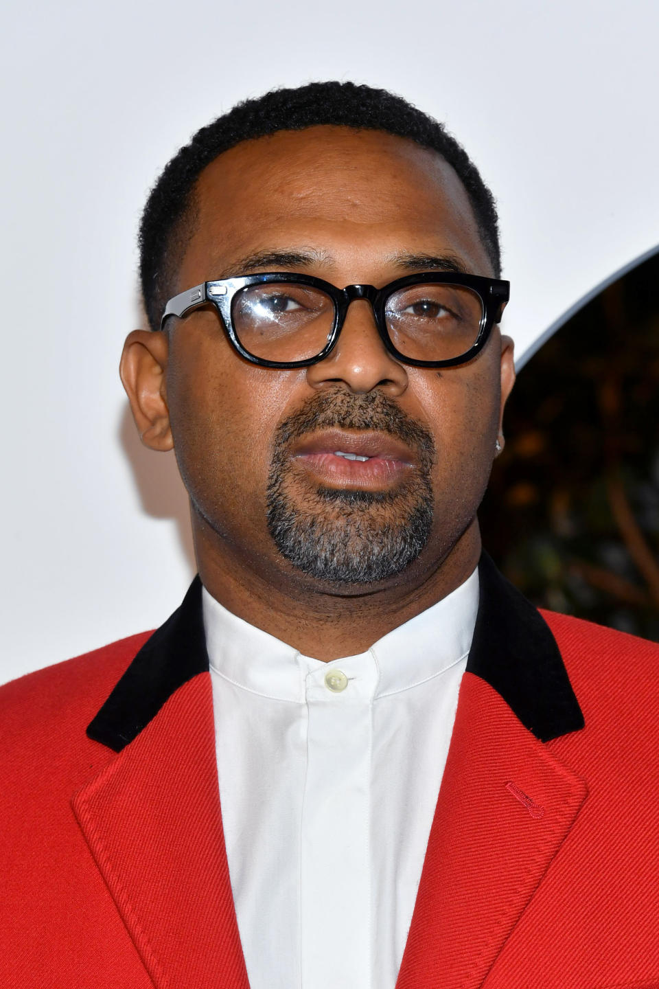 Mike Epps Wearing Red Suit