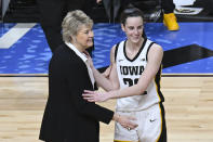 Iowa head coach Lisa Bluder and guard Caitlin Clark (22) talk on the court after defeating LSU in an Elite Eight round college basketball game during the NCAA Tournament, Monday, April 1, 2024, in Albany, N.Y. (AP Photo/Hans Pennink)