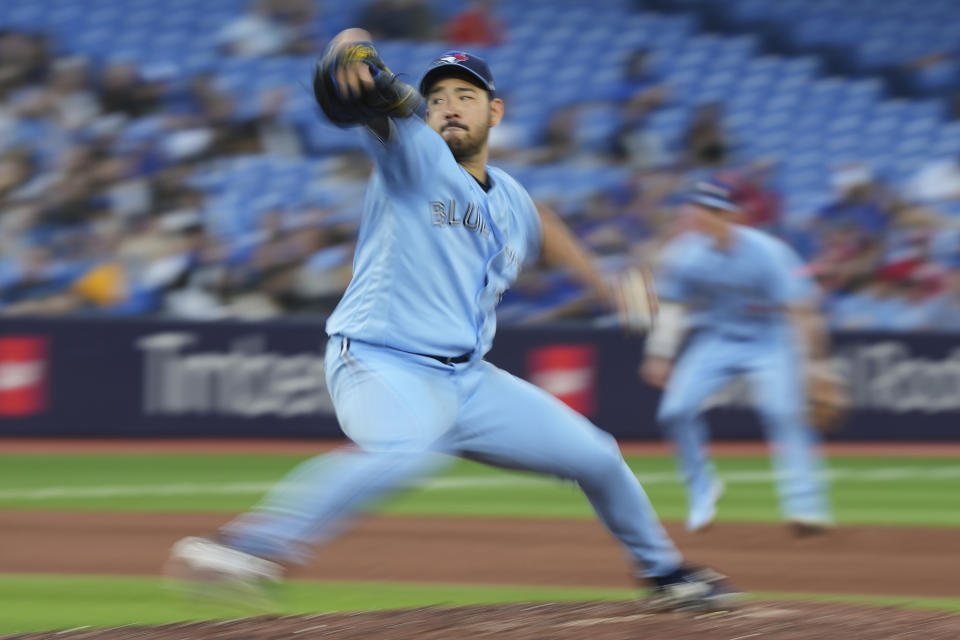 Toronto Blue Jays starting pitcher Yusei Kikuchi throws to a Milwaukee Brewers batter during the fourth inning of a baseball game Tuesday, May 30, 2023, in Toronto. (Nathan Denette/The Canadian Press via AP)