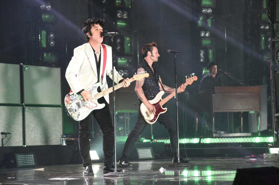 LOS ANGELES, CALIFORNIA - NOVEMBER 24: Billie Joe Armstrong and Mike Dirnt of Green Day perform onstage during the 2019 American Music Awards at Microsoft Theater on November 24, 2019 in Los Angeles, California. (Photo by Kevin Mazur/AMA2019/Getty Images for dcp)