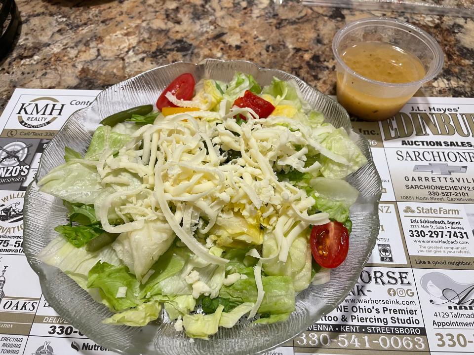 The house salad with a couple green beans hidden inside at Guido's in Ravenna.