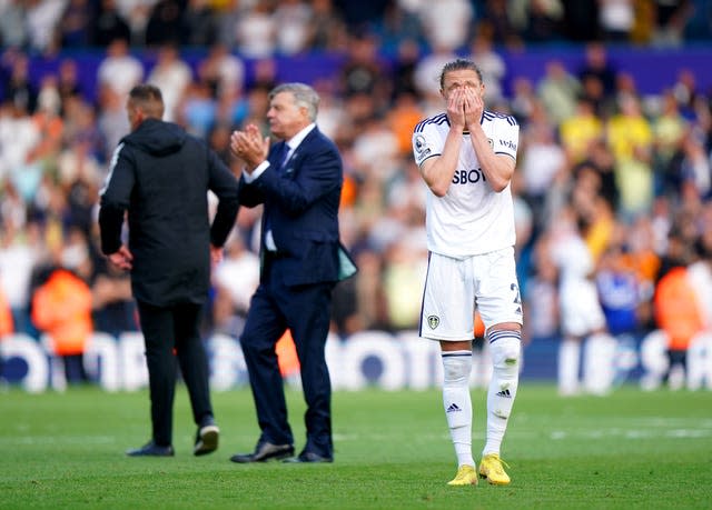 Luke Ayling (right) appears dejected