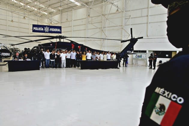 Members of La Familia are presented to the press at the Command Center in Mexico City, Mexico, in 2009. (Alfredo Estrella / AFP / Getty)