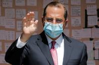 U.S. Secretary of Health and Human Services Azar waves to the media after paying his respects to the late former President of Taiwan Lee Teng-Hui at a memorial in Taipei