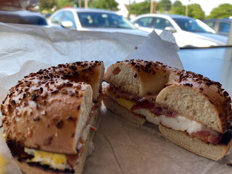 An egg, cheese and bacon sandwich on an onion bagel, shown Aug. 22, 2023 at The Bagel Place on Williston Road in South Burlington.