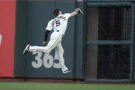 San Francisco Giants right fielder Mike Yastrzemski (5) makes a catch on a ball hit by Arizona Diamondbacks' Ketel Marte during the third inning of a baseball game Wednesday, June 16, 2021, in San Francisco. (AP Photo/Tony Avelar)