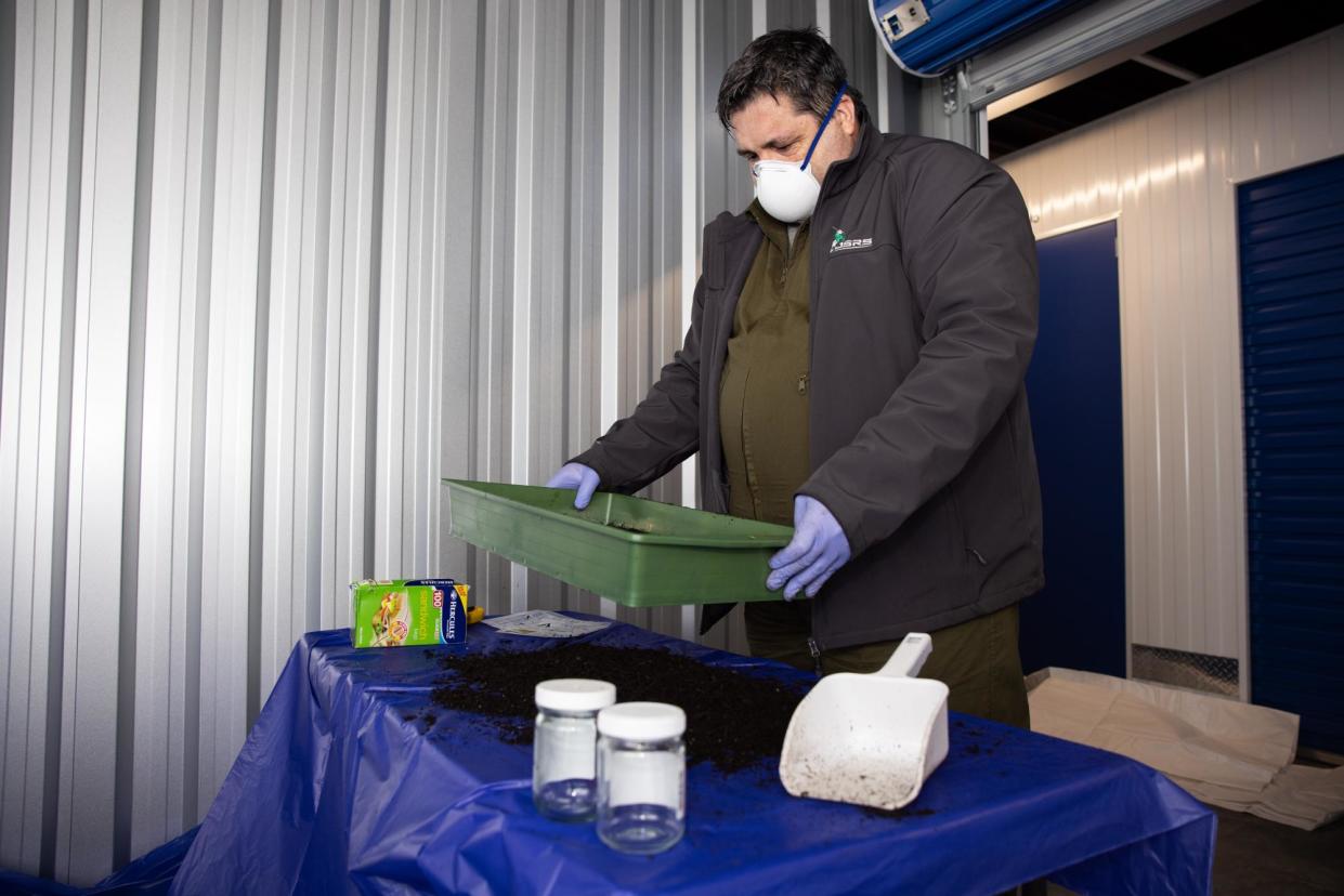 <span>Former senior waste compliance officer at the NSW EPA Jason Scarborough inspects samples taken from multiple soil bags from across Sydney. ‘Three out of the four products, I wouldn’t use,’ he says.</span><span>Photograph: Blake Sharp-Wiggins/The Guardian</span>