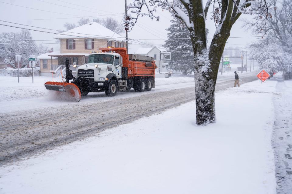 City of Des Moines snowplows work to clear streets after a night of heavy snowfall Tuesday, Jan. 9, 2024, in Des Moines.