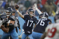 Tennessee Titans quarterback Ryan Tannehill (17) passes against the Houston Texans in the second half of an NFL football game Sunday, Nov. 21, 2021, in Nashville, Tenn. (AP Photo/Wade Payne)