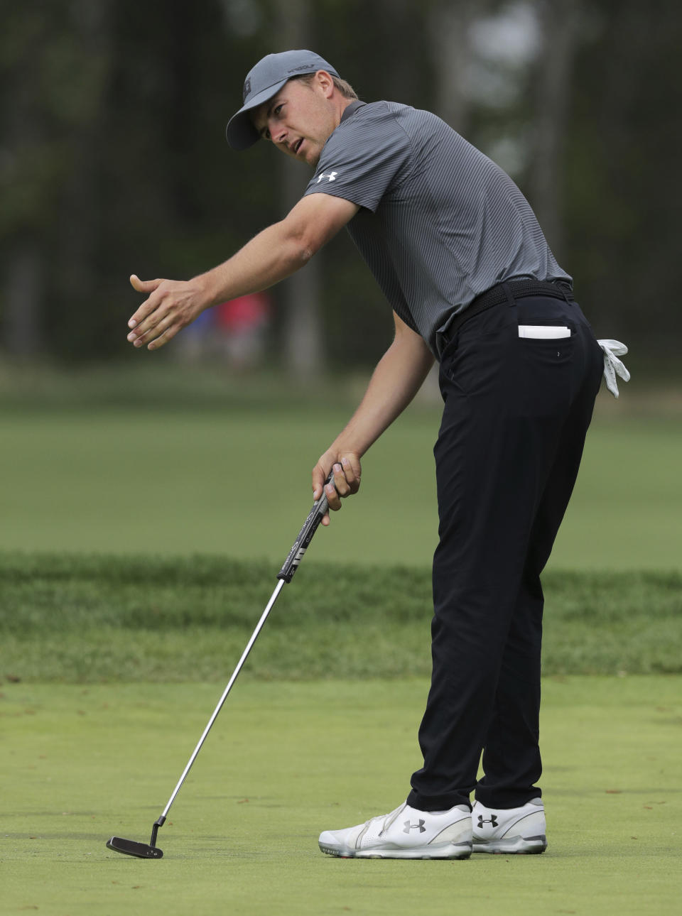 Jordan Spieth reacts to a putt on the ninth green during the final round of the PGA Championship golf tournament, Sunday, May 19, 2019, at Bethpage Black in Farmingdale, N.Y. (AP Photo/Charles Krupa)