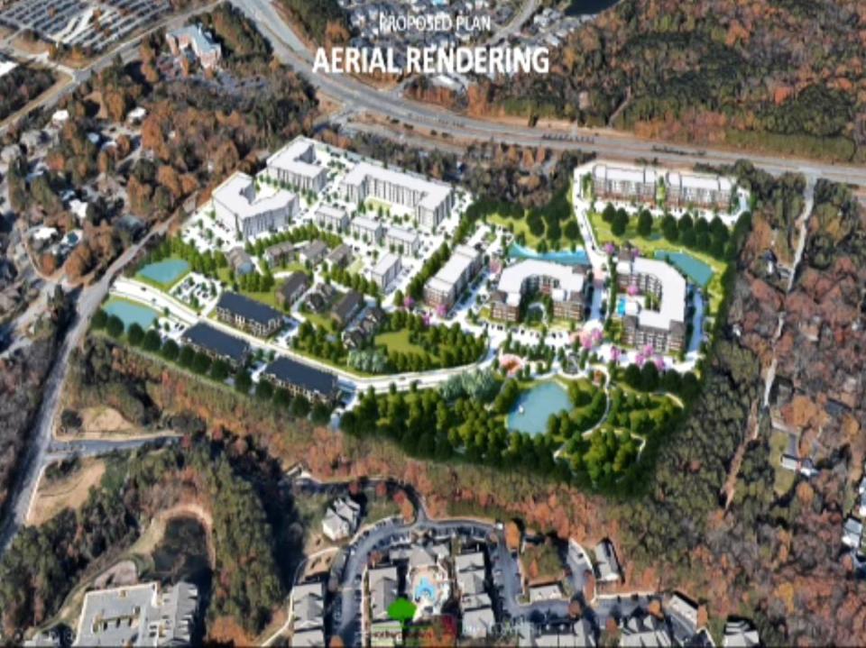 Hillmont is proposed with two apartment buildings fronting N.C. 54 in Chapel Hill, three more apartment buildings at the core, and townhouses and cottages at bottom left. At bottom right is a roughly 6-acre park that the town would like to be publicly accessible.