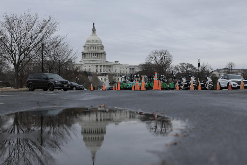 Traffic cones close off a section of Pennsylvania Ave. 