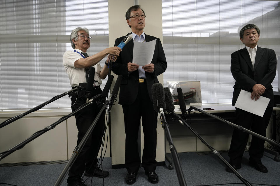 Yutaka Katada, center, president of Kokuka Sangyo Co., the Japanese company operating one of two oil tankers attacked near the Strait of Hormuz, talks to reporters during a news conference Friday, June 14, 2019, in Tokyo. Iran rejects a U.S. accusation against Tehran over suspected attacks on two oil tankers near the strategic Strait of Hormuz. (AP Photo/Jae C. Hong)