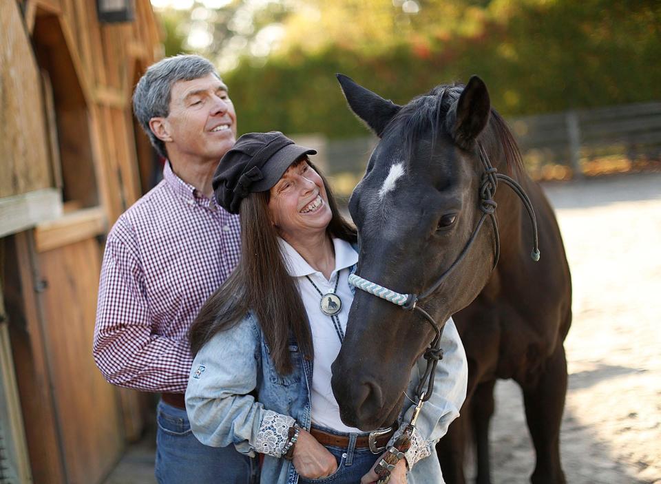 Wayne Westcott and his high school sweetheart, Claudia, take care of their horse, Valentine, and dog, Joy, at home in Abington. Wednesday, Oct. 20, 2021.