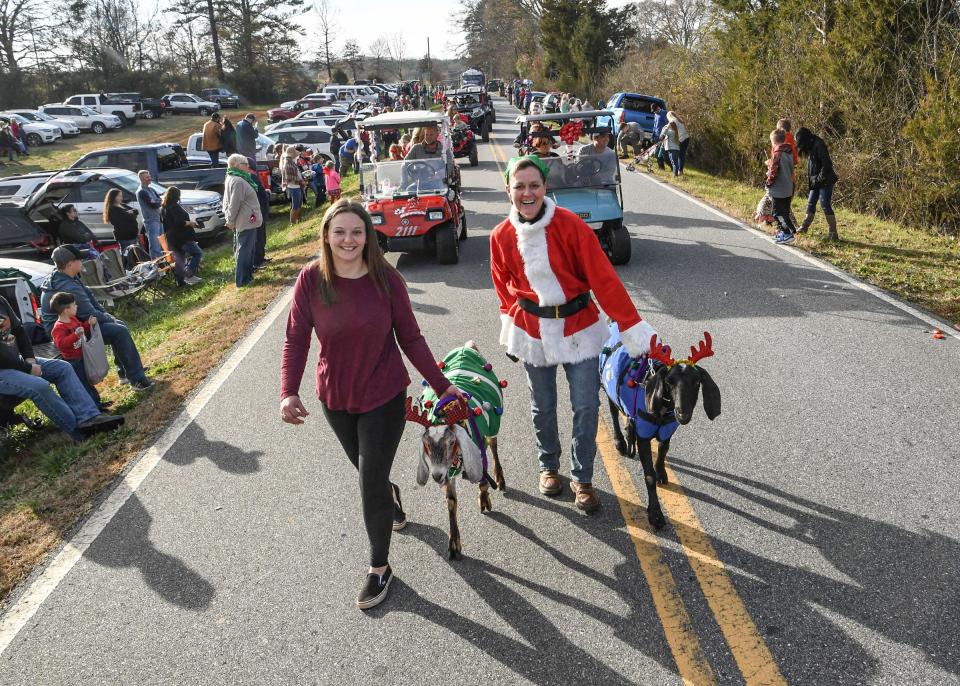 Split Creek Farm's Amanda Poole and Sandra Coffman in the Denver Christmas Parade with the theme Conquering COVID-19: A Joyful Parade" in Anderson, S.C. December 20, 2020.