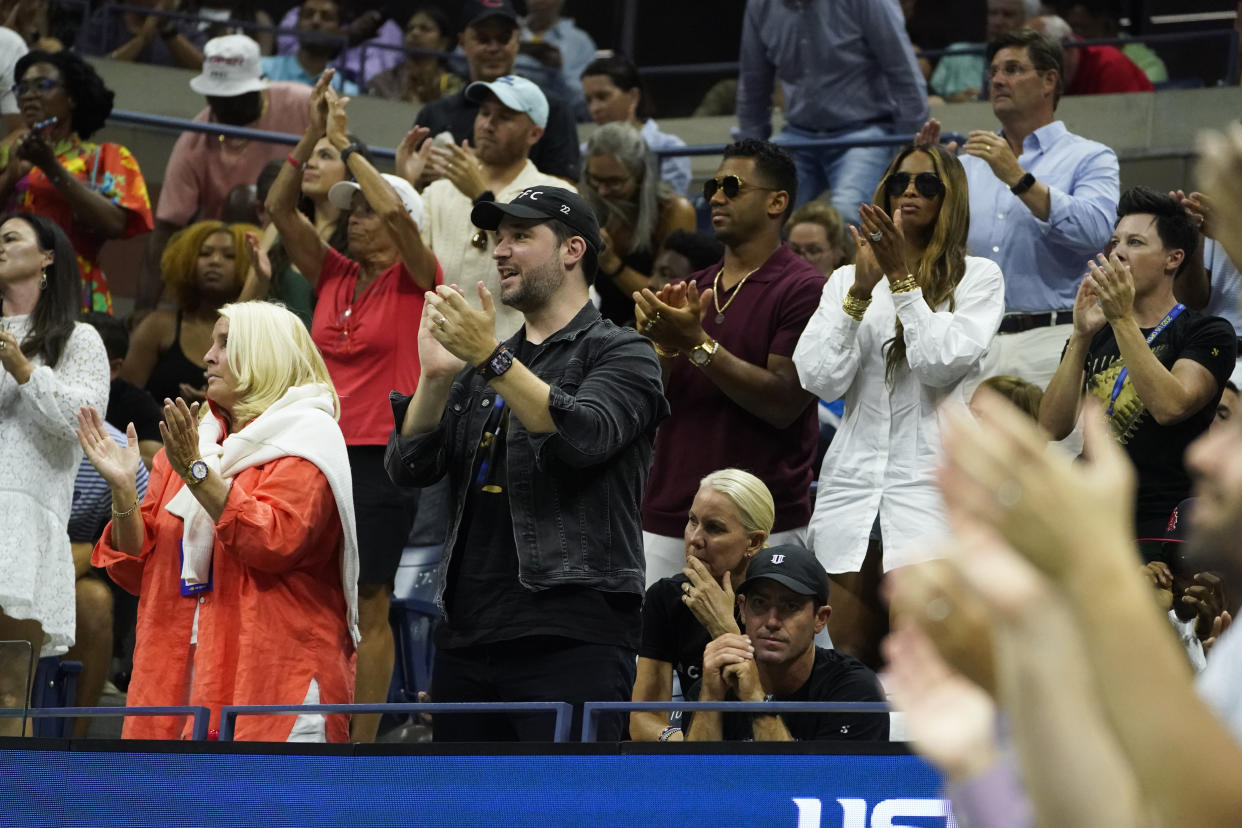 Fans including Alexis Ohanian cheer for Serena Williams, of the United States, during a match against Ajla Tomljanovic, of Australia, during the third round of the U.S. Open tennis championships, Friday, Sept. 2, 2022, in New York. (AP Photo/John Minchillo)