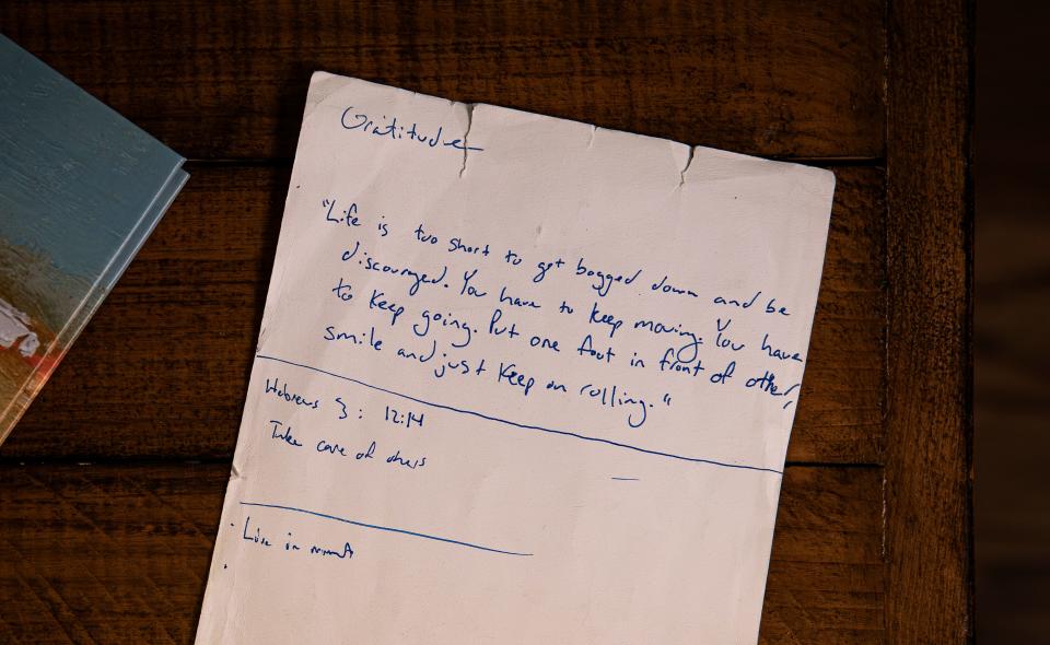 A piece of paper with a quote from Kobe Bryant, in Josh Barrick's handwriting, rests on a coffee table in the Barrick home in Louisville, Kentucky. After Josh's death on April 10, 2023, Jessica would find notes and Bible quotes he had written to himself as motivation. Jessica now has a tattoo of the final line on her arm -- 'smile and just keep rolling" -- in remembrance of her husband. March 14, 2024