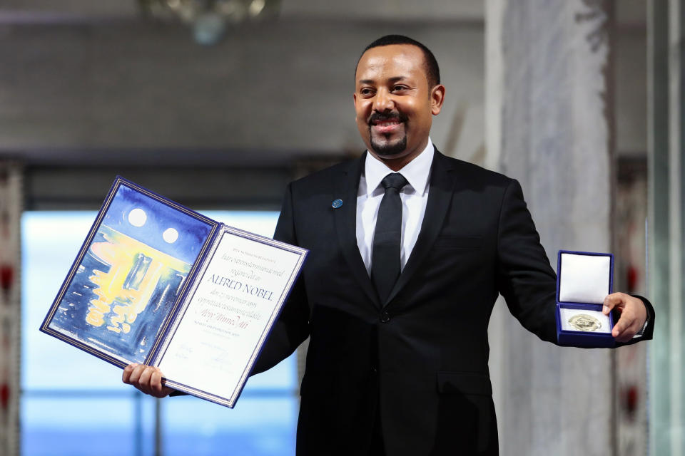 FILE - Ethiopia's Prime Minister Abiy Ahmed poses for the media after receiving the Nobel Peace Prize during the award ceremony in Oslo City Hall, Norway, Tuesday Dec. 10, 2019. Ethiopian Prime Minister Abiy Ahmed won in 2019 for making peace with neighboring Eritrea and a year later a year brutal and largely ethnic conflict erupted in a rebellious region of the country, Tigray. Some accuse Abiy himself of stoking the tensions, which have resulted in atrocities committed by his army along with all sides in the war, and critics have called for his Nobel to be revoked. (Hakon Mosvold Larsen/NTB Scanpix via AP, File)