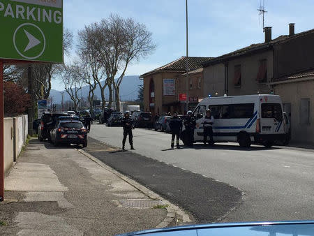 Police are seen at the scene of a hostage situation in a supermarket in Trebes, Aude, France March 23, 2018 in this picture obtained from a social media video. LA VIE A TREBES/via REUTERS