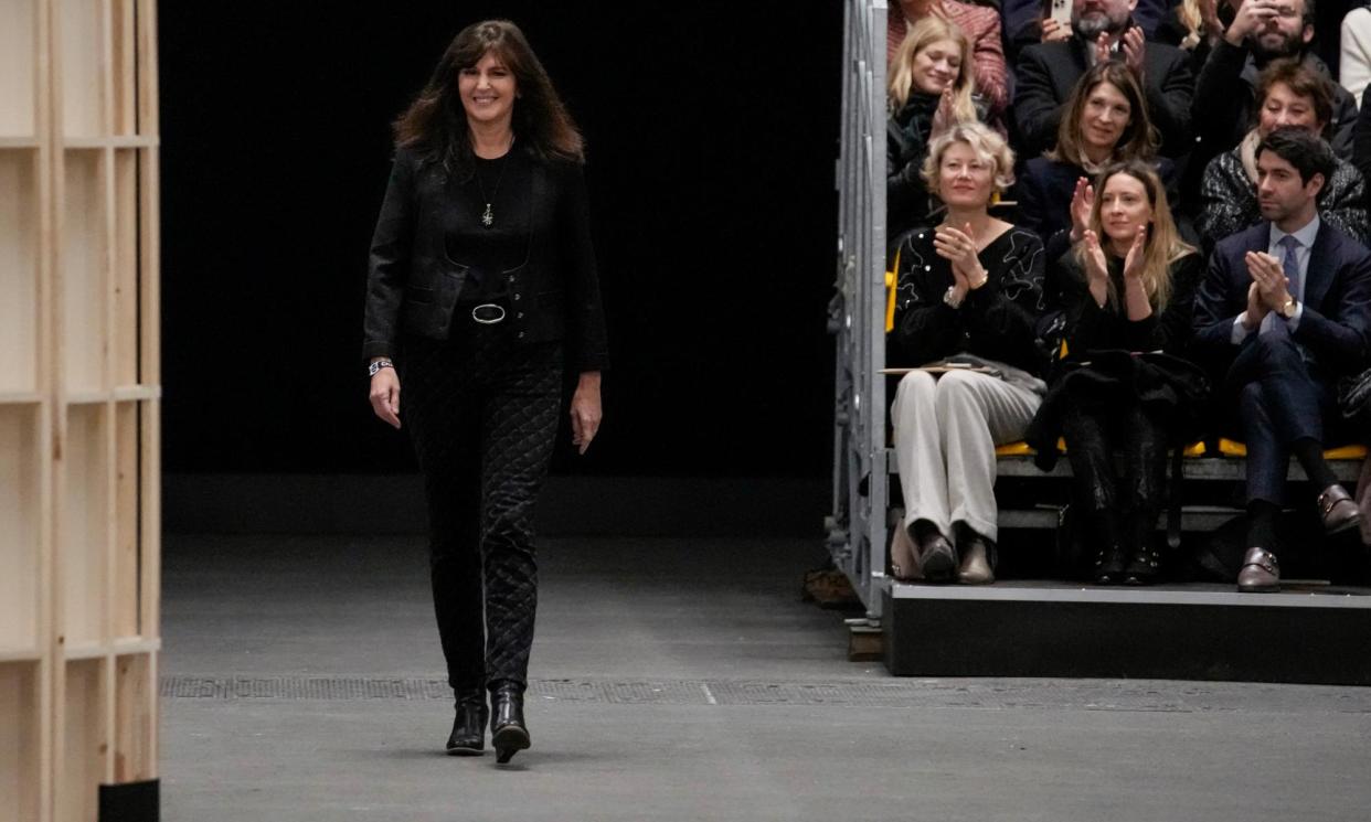 <span>Virginie Viard accepts applause at the end of Chanel’s spring/summer 2023 couture catwalk in Paris in January last year.</span><span>Photograph: Christophe Ena/AP</span>