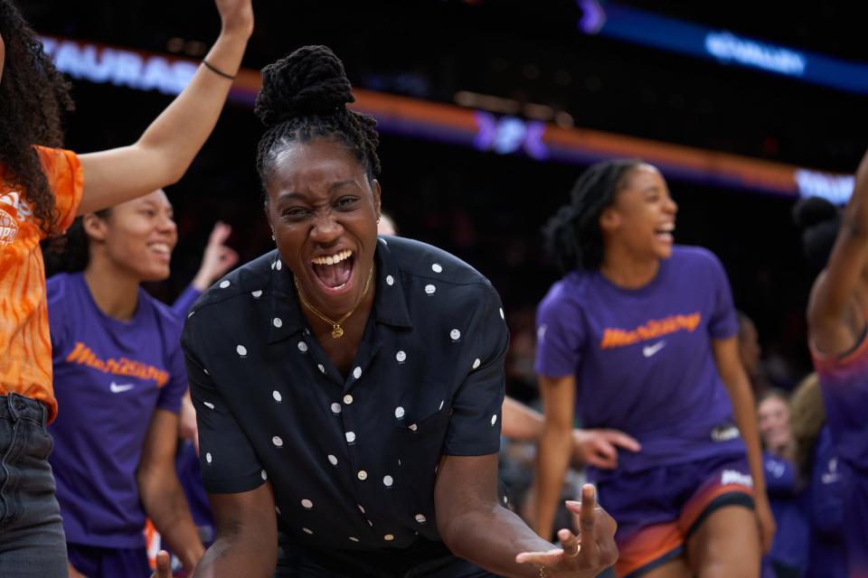 Jun 3, 2022; Phoenix, AZ, USA; Phoenix Mercury center Tina Charles (31), who is out with a right shoulder injury, reacts and mugs the camera after a three-pointer against the Connecticut Sun at Footprint Center. Mandatory Credit: Alex Gould/The Republic