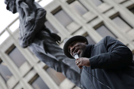 Reverend Mark Kelly Tyler speaks as protesters gather at Philadelphia police headquarters, a week after two black men were arrested at a Starbucks coffee shop, in Philadelphia, Pennsylvania, U.S. April 19, 2018. REUTERS/Dominick Reuter