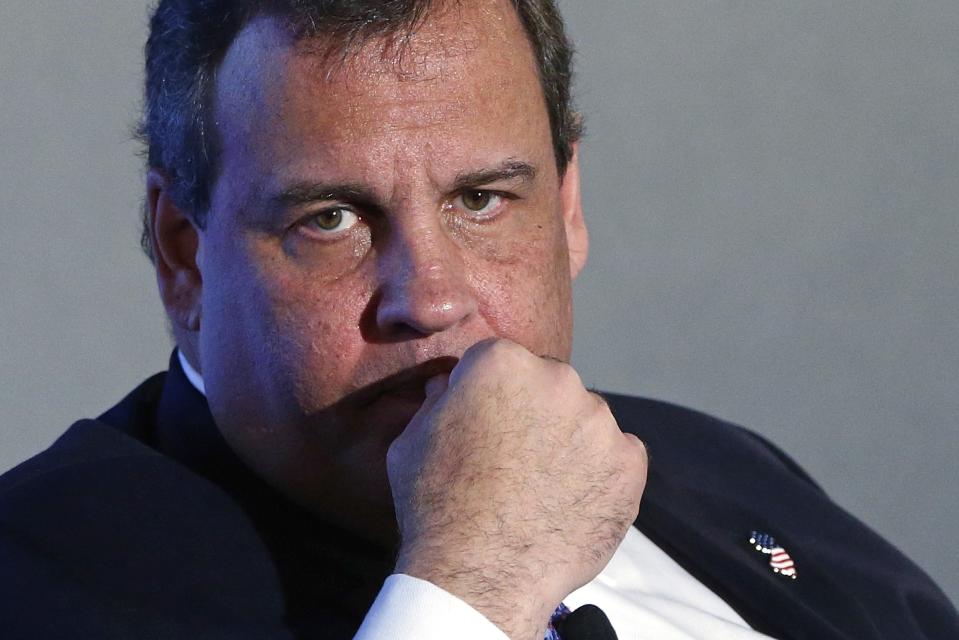 New Jersey Governor Chris Christie (R-NJ) listens during an onstage interview at the 2014 Peterson Foundation Fiscal Summit in Washington in this file photo taken May 14, 2014. The New Jersey state Assembly on Thursday sent Governor Chris Christie a gun control bill that would limit the capacity of gun ammunition magazines, but it was unclear whether the Republican governor would sign the measure into law. REUTERS/Jonathan Ernst/Files (UNITED STATES - Tags: POLITICS BUSINESS)