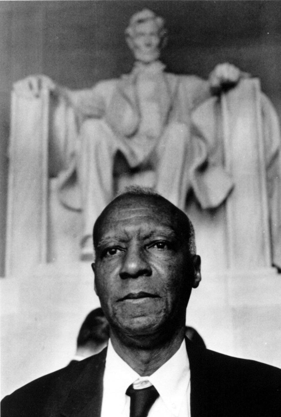 A. Philip Randolph, a Florida-born labor leader and civil rights pioneer, stands outside the Lincoln Memorial in Washington, D.C.