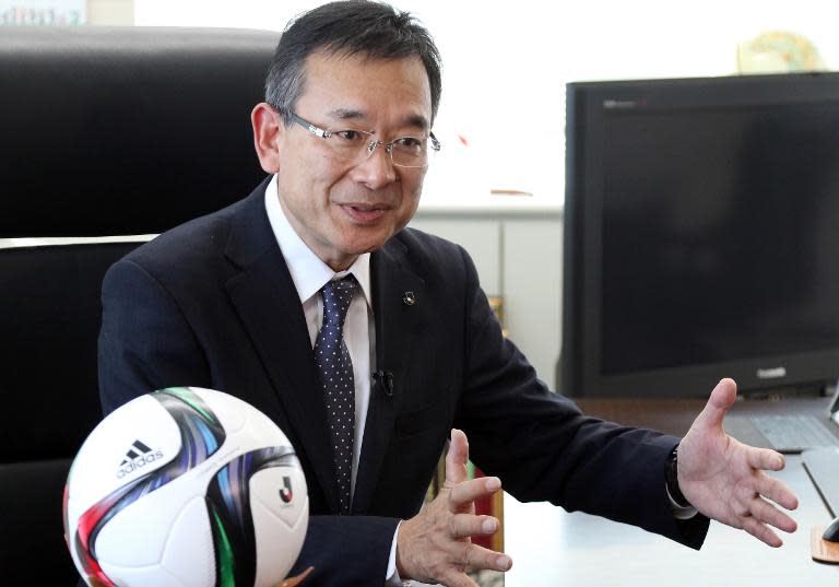 Japan's J-League chairman Mitsuru Murai speaks during an interview at the headquarters of the Japan Football Association in Tokyo, on March 2, 2015