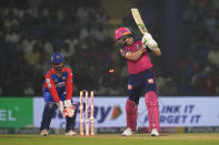 Rajasthan Royals' Jos Buttler bowled out by Delhi Capitals' Axar Patel during the Indian Premier League cricket match between Delhi Capitals and Rajasthan Royals in New Delhi, India, Tuesday, May 7, 2024. (AP Photo/Manish Swarup)