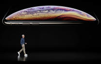 <p>Apple CEO Tim Cook speaks about the Apple iPhone XS at the Steve Jobs Theater during an event to announce new Apple products Wednesday, Sept. 12, 2018, in Cupertino, Calif. (AP Photo/Marcio Jose Sanchez) </p>