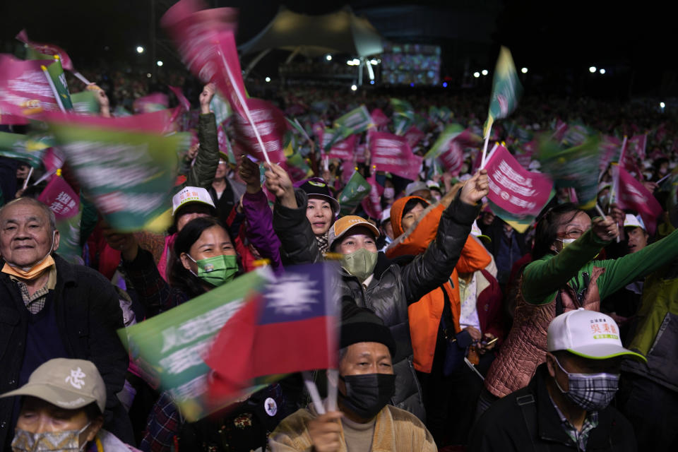 Supporters cheer for the Democratic Progressive Party during an elections rally in New Taipei City, Taiwan on Saturday, Jan. 6, 2024. Using military threats, diplomatic pressure, fake news and financial inducements for politicians, China is deploying a broad strategy to influence voters in Taiwan’s elections to pick candidates who favor unification. (AP Photo/Ng Han Guan)