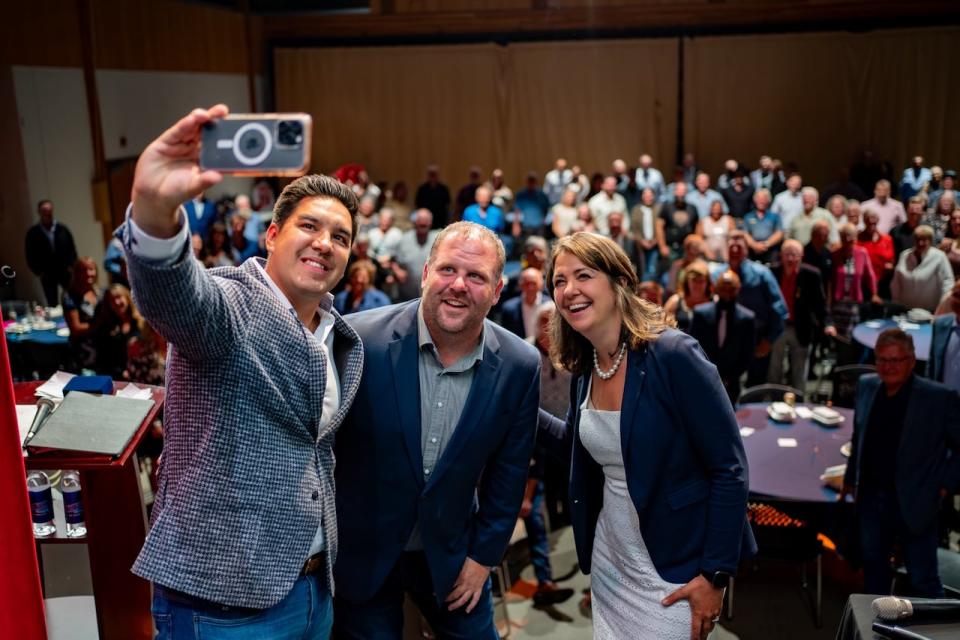 Premier Smith (right) has spent much of August at UCP members'-only meetings and fundraisers, including an event this week in Slave Lake with Scott Sinclair (left) and Brandon Lunty.