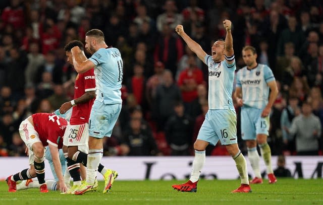 Mark Noble (right) celebrates the win