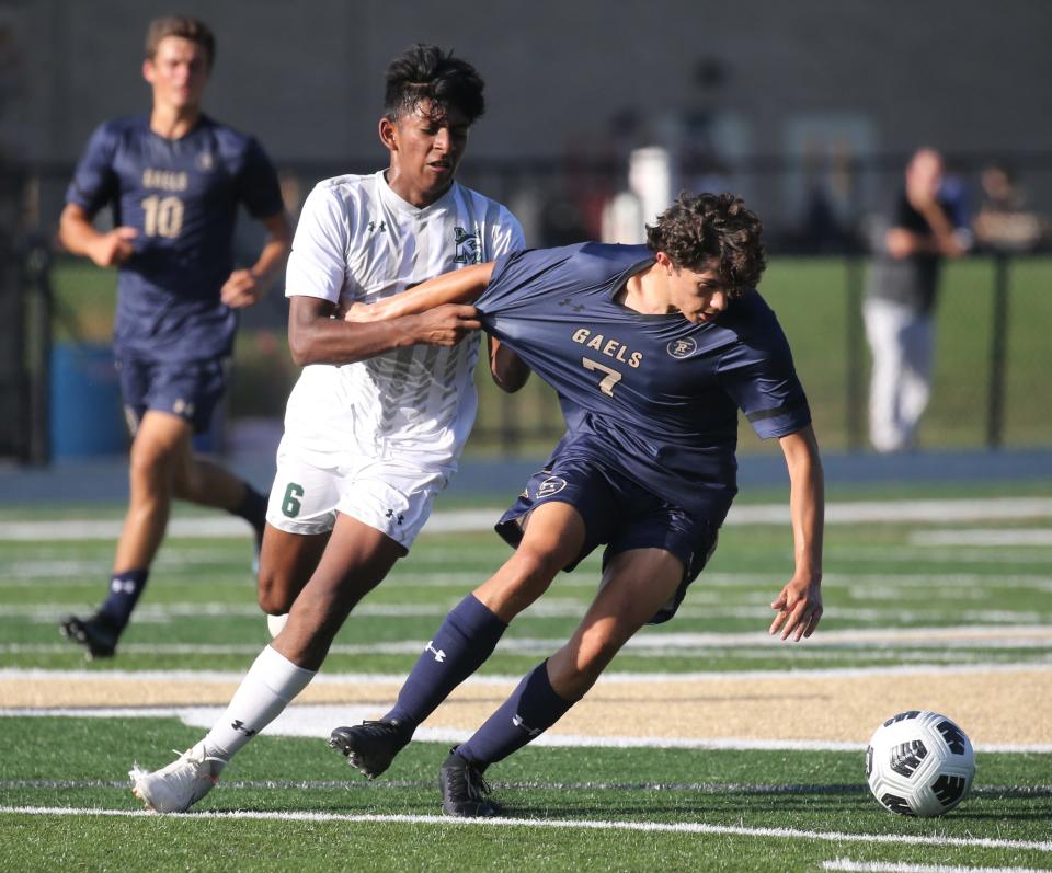 Armaan Agarwal of Montville tries to keep Lucas Sosa of Roxbury from the ball as Roxbury topped Montville 6-1 in NJAC-American boys soccer played in Roxbury, NJ on September 21, 2022.
