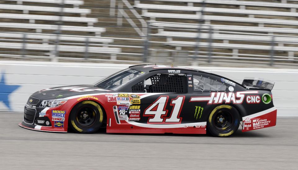 Kurt Busch makes a turn during a practice session for the NASCAR Sprint Cup Series auto race at Texas Motor Speedway in Fort Worth, Texas, Saturday, April 5, 2014. (AP Photo/LM Otero)