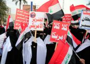 Supporters of Iraqi Shi'ite cleric Moqtada al-Sadr protest against what they say is U.S. presence and violations in Iraq, during a demonstration in Baghdad