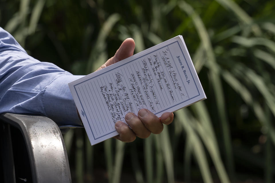 Democratic presidential candidate former Vice President Joe Biden holds a note card as he speaks during a backyard meeting in Lancaster, Pa., Sept. 7, 2020. Biden is a man who writes down his thoughts. And some of those handwritten musings over his decades of public service are now a part of a special counsel's investigation into the handling of classified documents. It isn't clear yet what the investigators are looking for by taking the notes from his time as vice president and his years in the Senate, from his beach home in Rehoboth and his primary residence in Wilmington, Del. (AP Photo/Carolyn Kaster, File)